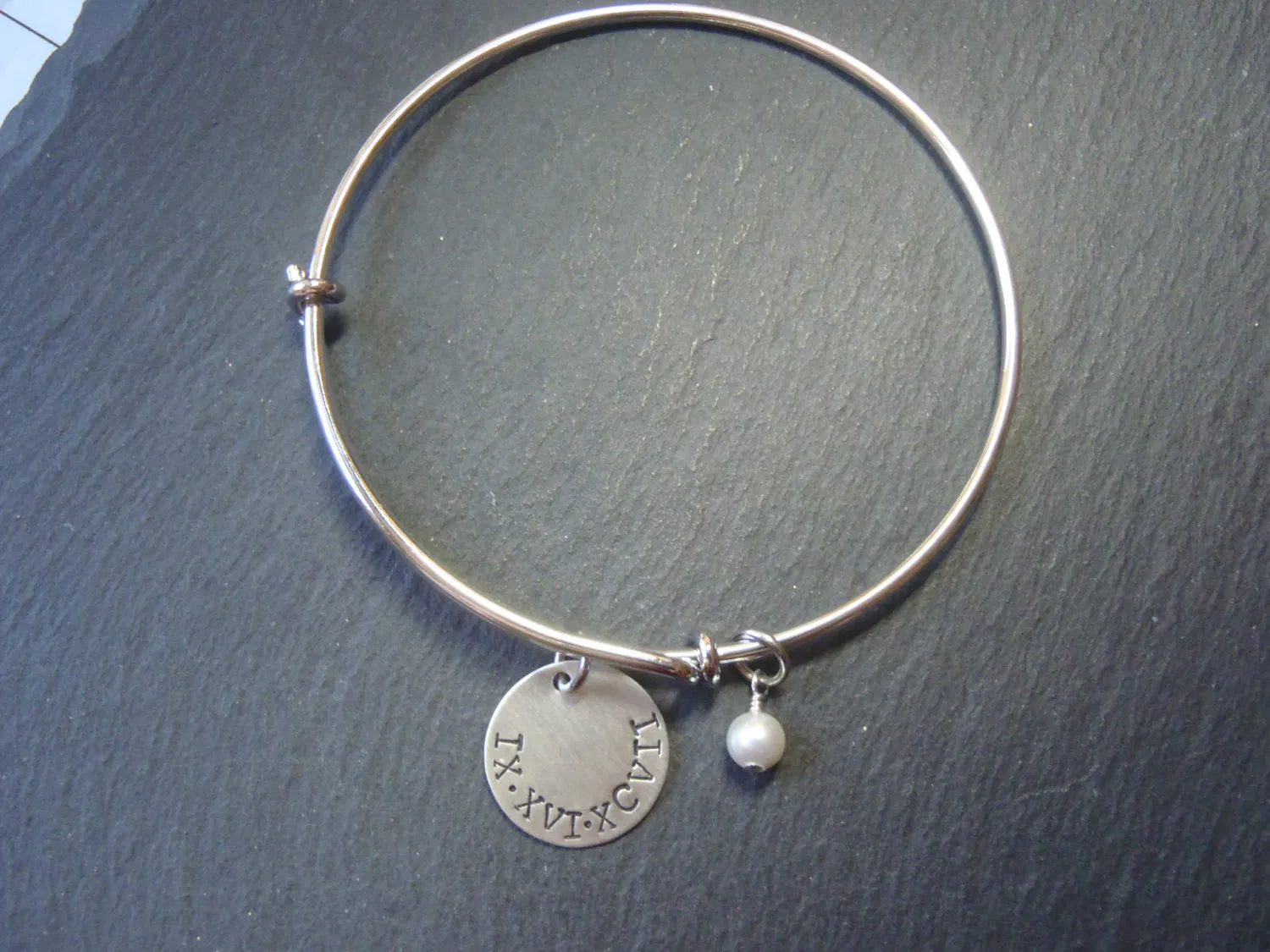Roman Numeral bracelet with personalized hand stamped date or name and a pearl charm