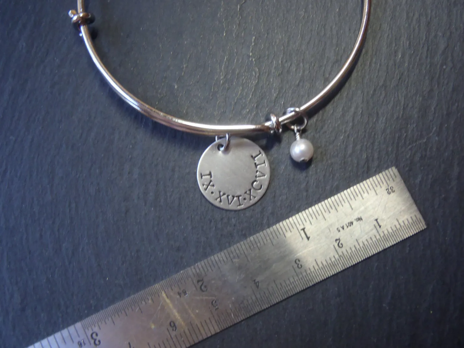 Roman Numeral bracelet with personalized hand stamped date or name and a pearl charm